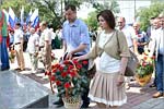 Laying flowers to the monument 'Eternal Flame'. Prorector for Social and Educational Affairs Sergey Semyonov and OSU Rector Zhanna Ermakova