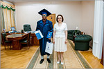 Zhanna Ermakova, OSU Rector presented two graduation diplomas to the student from Equatorial Guinea.     [182 Kb]